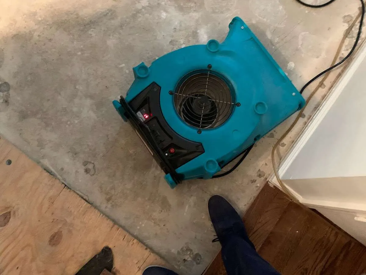 Air mover drying subfloor during Leak Detection & Repair in Marblehead