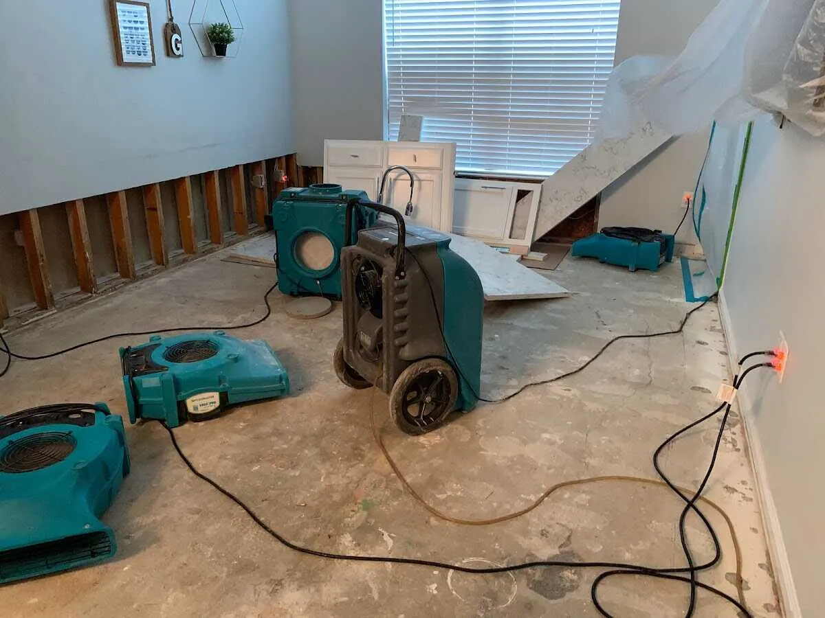 Dehumidifier in flood-cut room for Water Damage Restoration in Marblehead